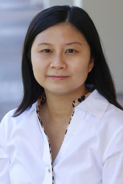 Dr. Marie Winged Lau